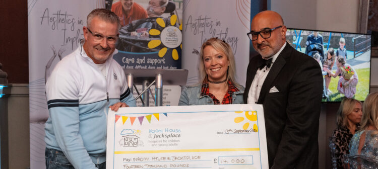Presenting the cheque to Naomi House and Jacksplace
